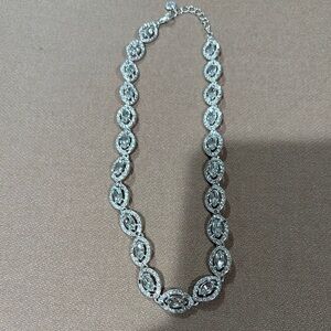 Intricate Silver Necklace with Swirling Design